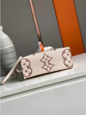 Louis Vuitton Replica M45654 LV Replica OnTheGo PM tote Bag in Cream/Bois de Rose Pink Monogram Empreinte leather