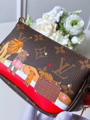 Louis Vuitton Replica Monogram Canvas Mini Pochette Accessoires Bag Lions Print M63830